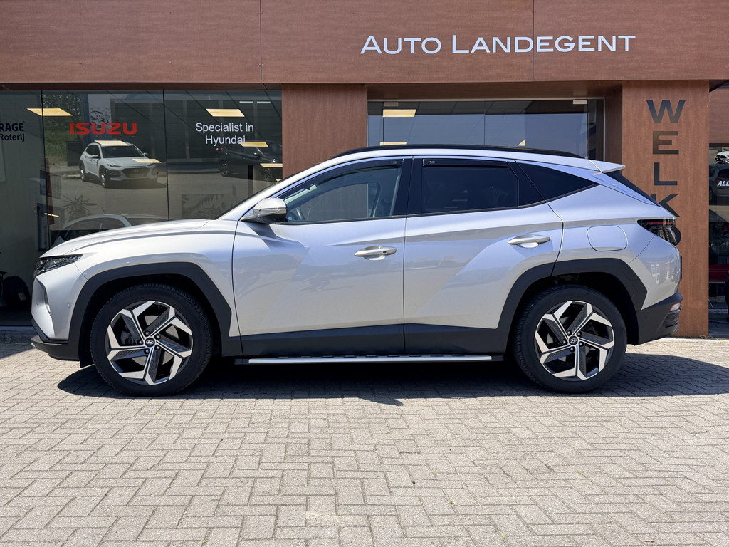 Hyundai Tucson 1.6 T-GDI HEV Premium Sky | Trekhaak | 1650 kg trekgewicht | Panoramadak | Full options 53954652-0.jpg | Auto Landegent