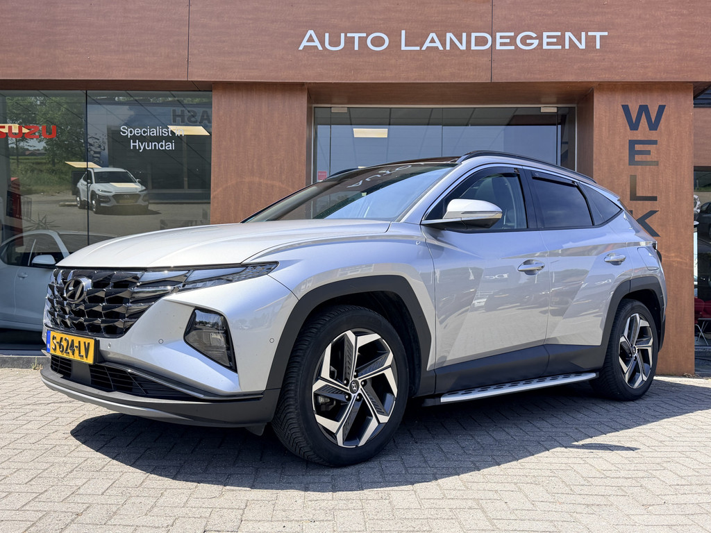 Hyundai Tucson 1.6 T-GDI HEV Premium Sky | Trekhaak | 1650 kg trekgewicht | Panoramadak | Full options 53954652-1.jpg | Auto Landegent
