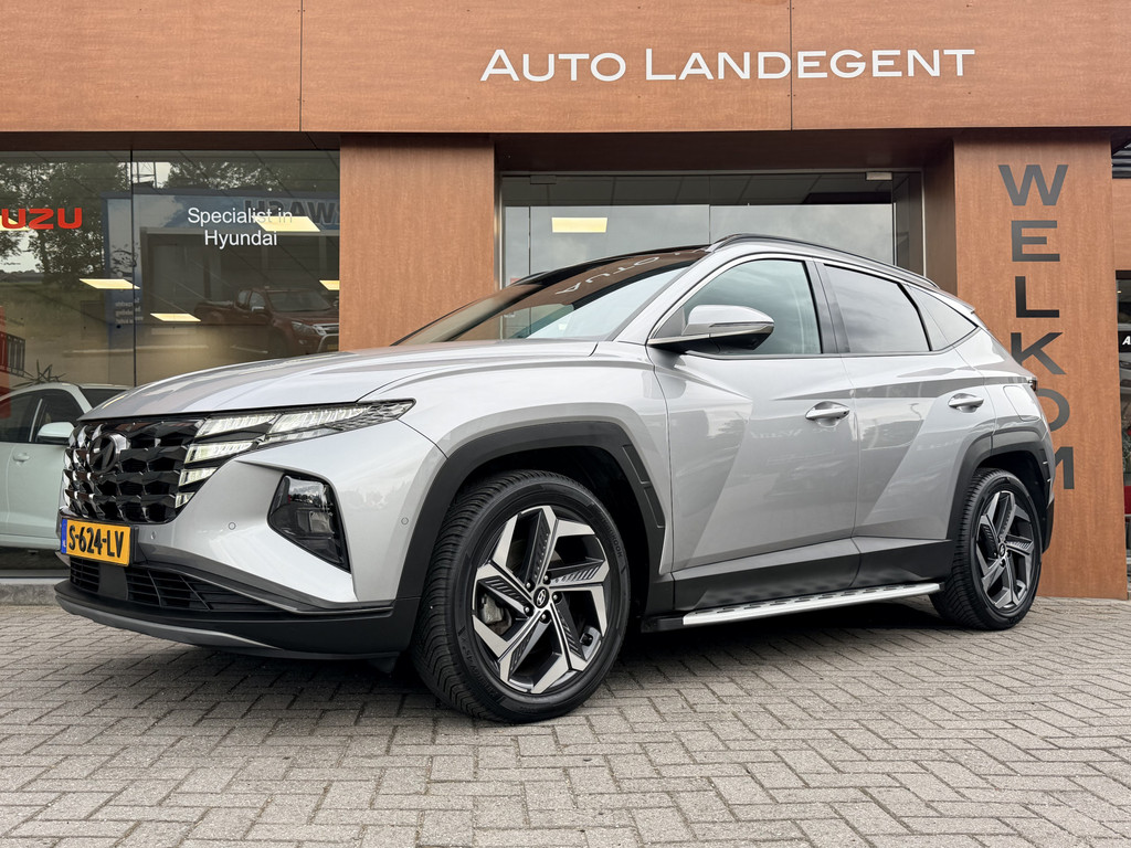Hyundai Tucson 1.6 T-GDI HEV Premium Sky | Trekhaak | 1650 kg trekgewicht | Panoramadak | Full options 53954652-1.jpg | Auto Landegent
