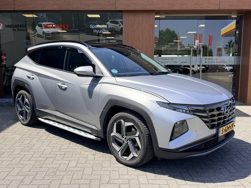 Hyundai Tucson 1.6 T-GDI HEV Premium Sky | Trekhaak | 1650 kg trekgewicht | Panoramadak | Full options 53954652-3.jpg | Auto Landegent