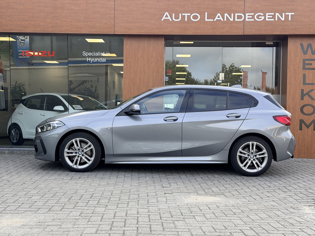 BMW 1 Serie 118i M-Sport | Carplay | Parkeer sensoren | DAB | Cruise control | Climate control 56431499-0.jpg | Auto Landegent