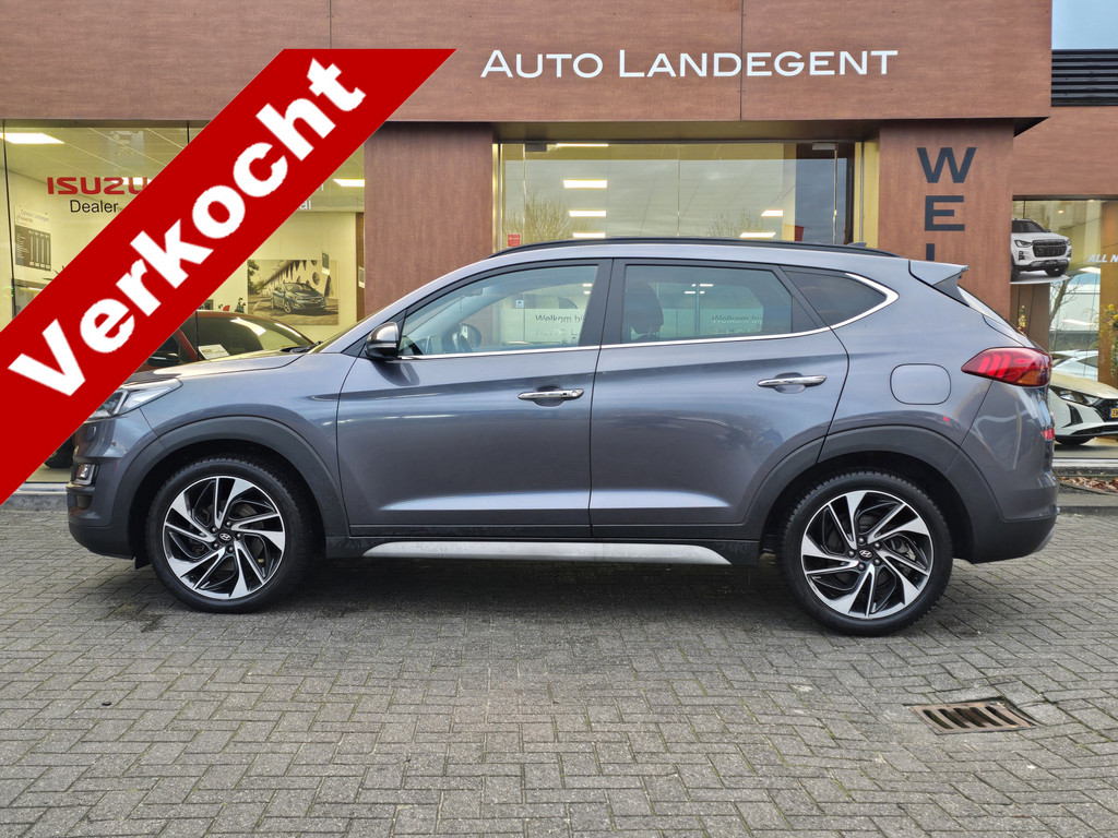 Hyundai Tucson 1.6 T-GDI Premium | Apple/ Android carplay | Camera | Trekhaak | Cruise control 50081983-0.jpg | Auto Landegent