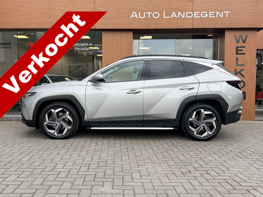 Hyundai Tucson 1.6 T-GDI HEV Premium Sky | Trekhaak | 1650 kg trekgewicht | Panoramadak | Full options 53954652-0.jpg | Auto Landegent